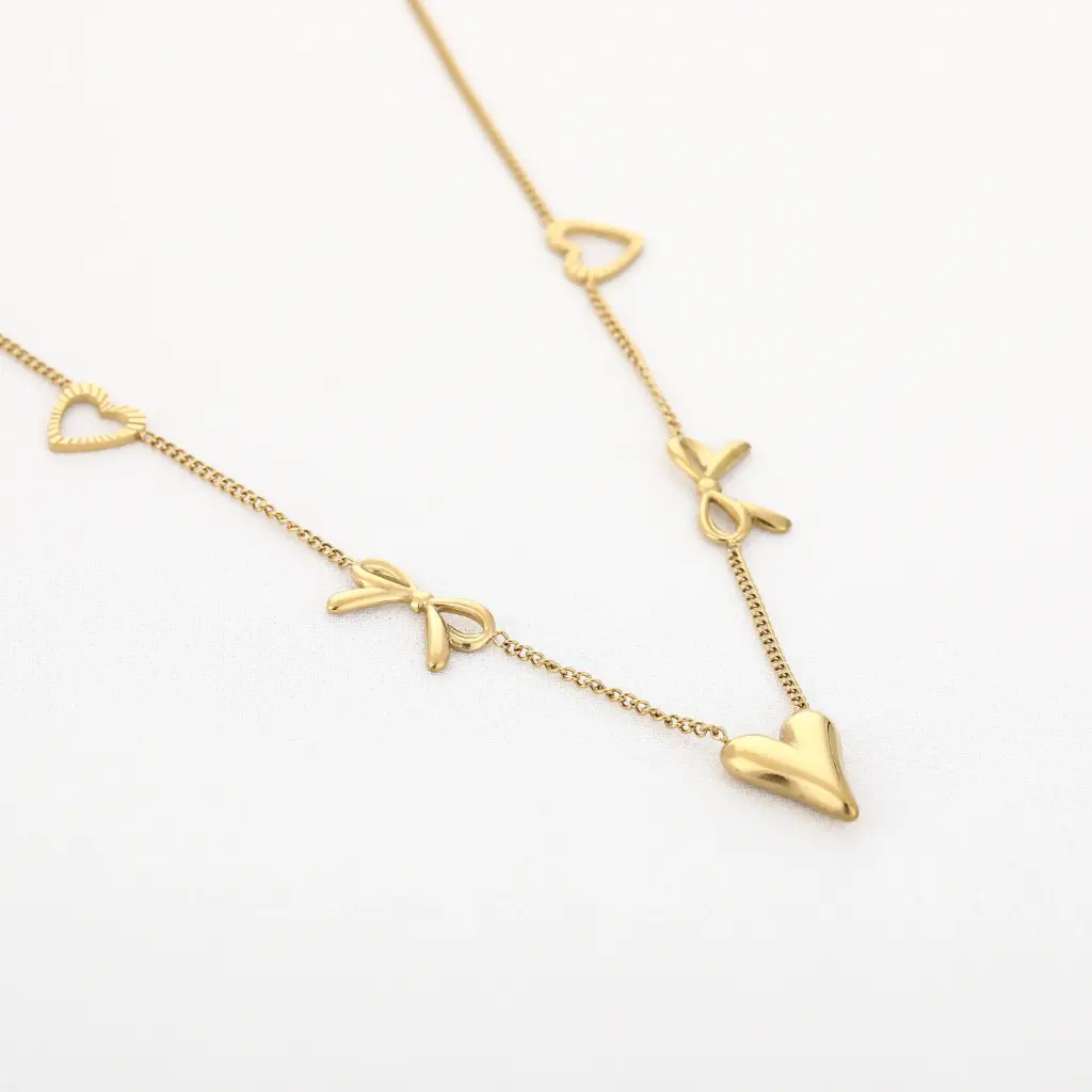 Michelle Bijou ketting bow/hearts gold