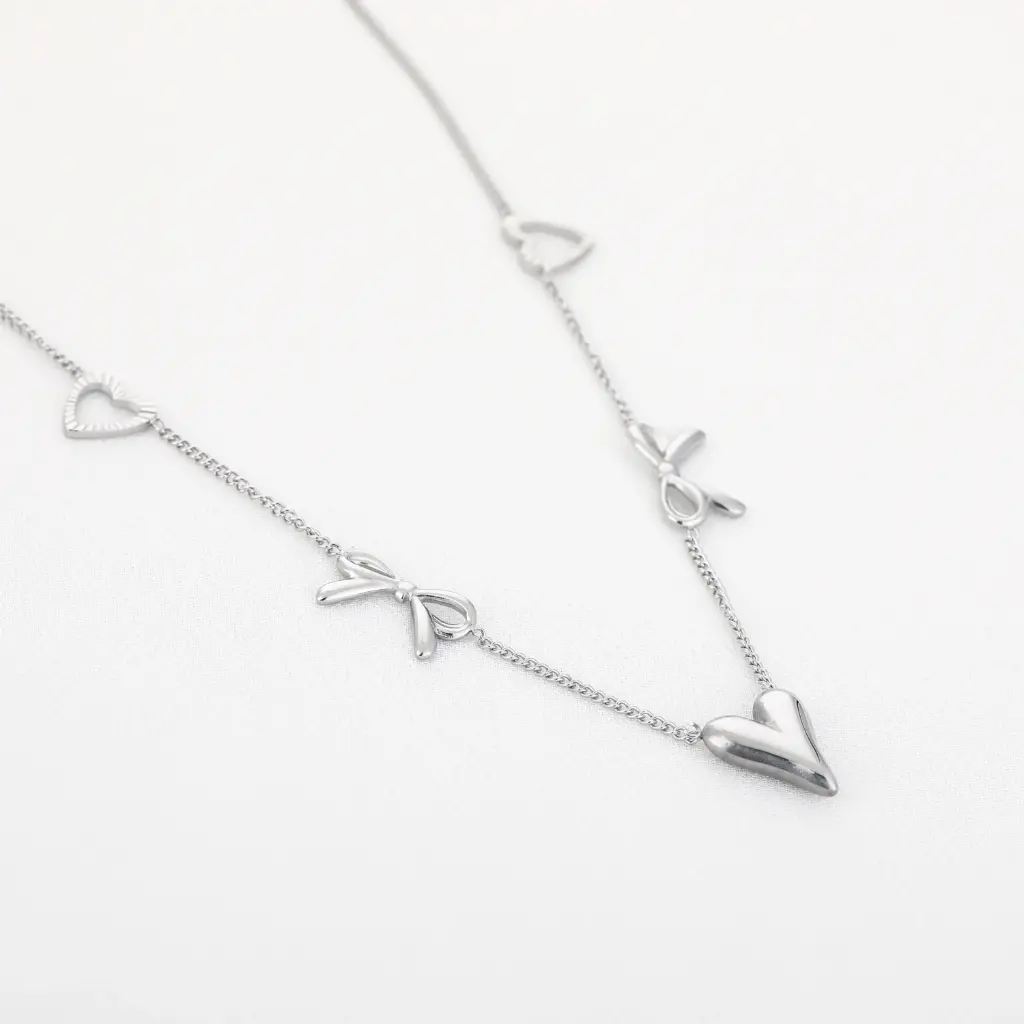 Michelle Bijou ketting bow/hearts zilver