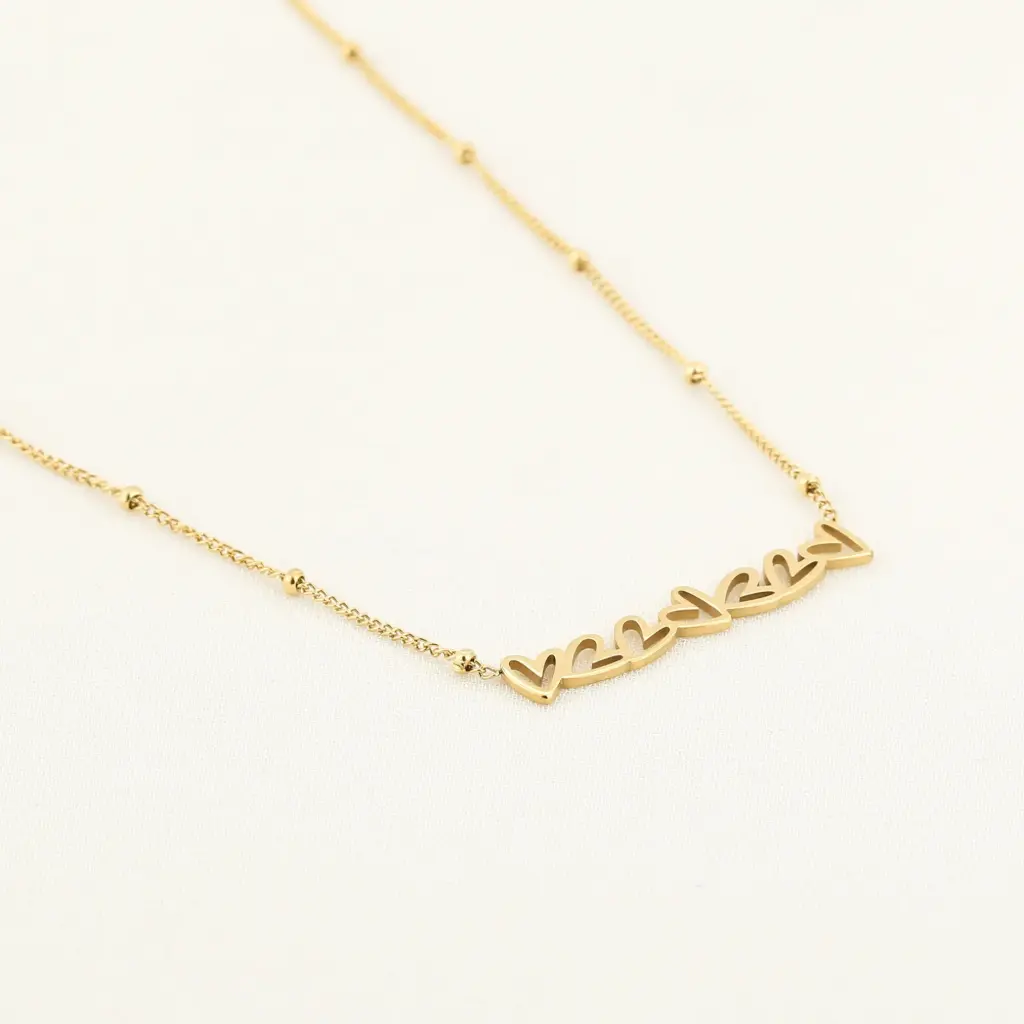 Michelle Bijou ketting kleine hartjes goud