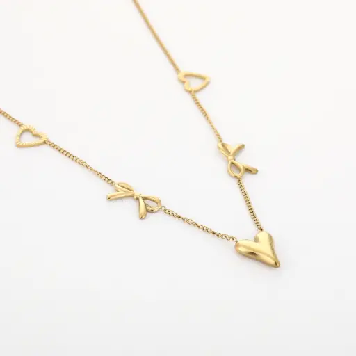 Michelle Bijou ketting bow/hearts gold